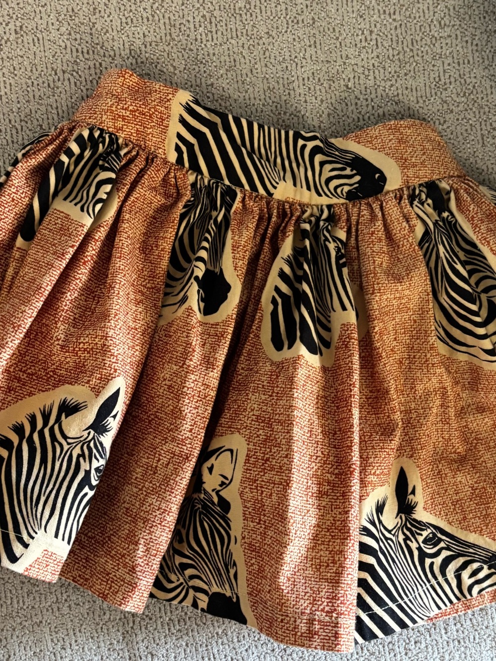 Never used Anthropologie Zebra Print Circle Skirt in Rust and Black